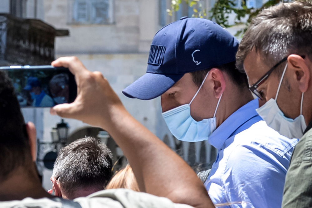 Manchester United football team captain Harry Maguire leaves a courthouse on the Greek island of Syros, the administrative hub of the Cycladic island group that includes Mykonos on August 22, 2020.   AFP / EUROKINISSI
