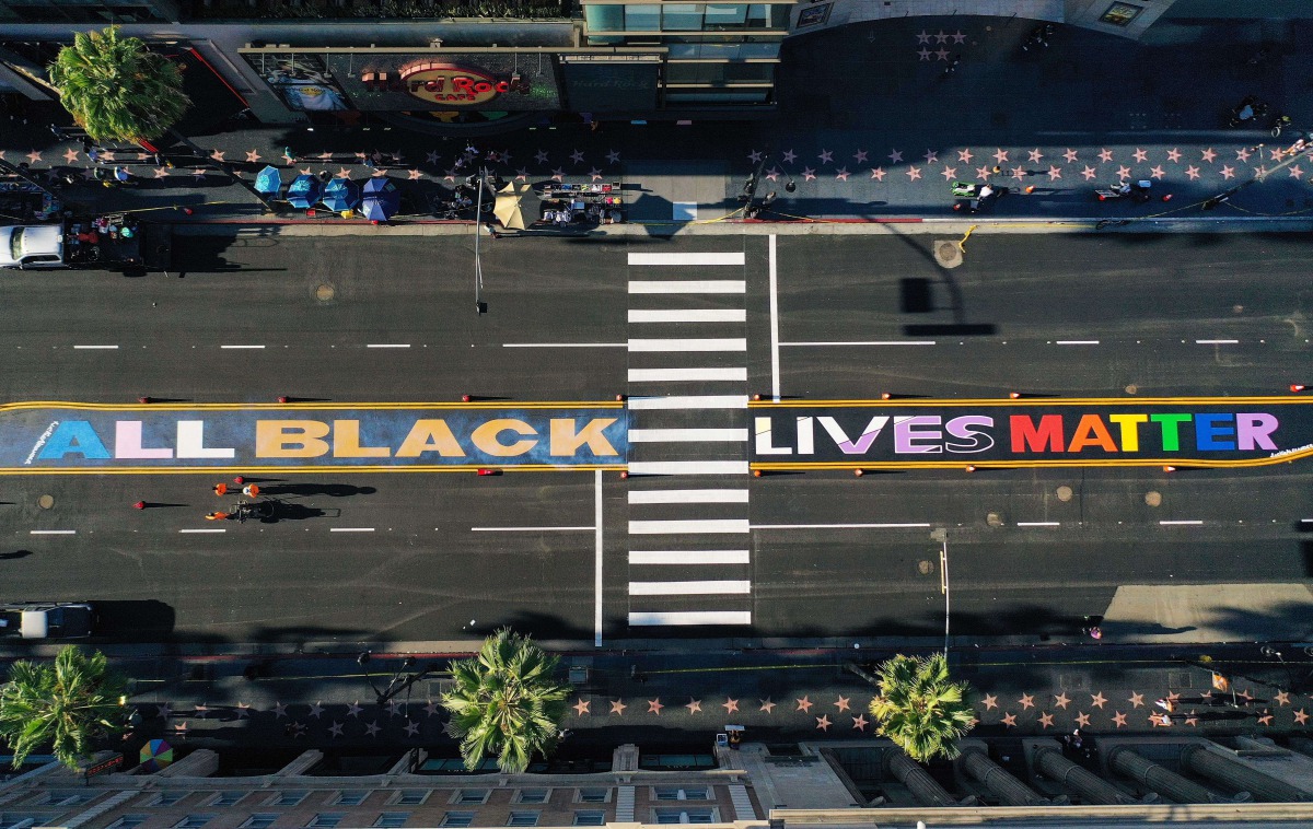 LOS ANGELES, CALIFORNIA - AUGUST 28: An aerial view of the new permanent 'All Black Lives Matter' mural after it was painted on Hollywood Boulevard on August 28, 2020 in Los Angeles, California. Mario Tama/Getty Images/AFP
