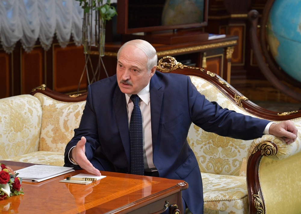 Belarus President Alexander Lukashenko speaks with Russian Prime Minister during their meeting at the Independence Palace in Minsk on September 3, 2020. AFP / Sputnik / Alexander ASTAFYEV