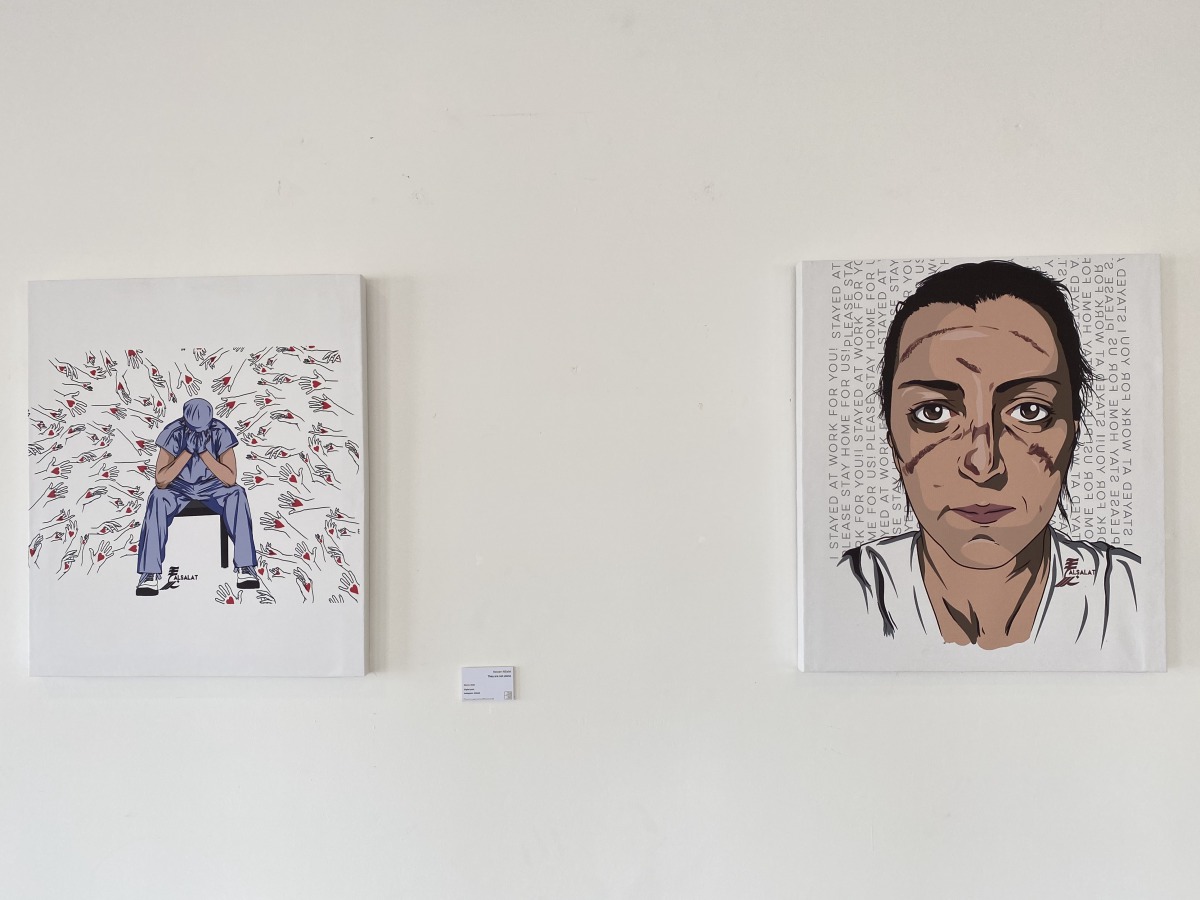 “They are not alone” (left) and “Scars of Humanity” by Hassan Alsalat on display at ‘Artists in the time of COVID-19’ exhibition which opened yesterday at the Sheikh Faisal Bin Qassim Al Thani Museum. RAYNALD C RIVERA/THE PENINSULA