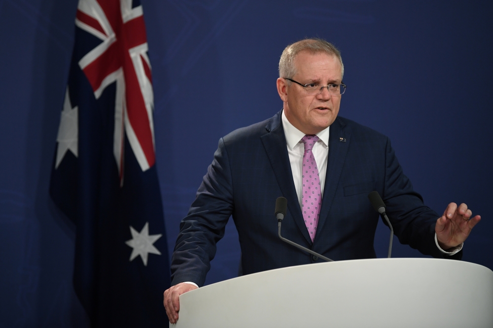 Australia's Prime Minister Scott Morrison speaks to the media during a news conference in Sydney, Australia, July 27, 2020. Picture taken July 27, 2020. AAP Image/Joel Carrett/via REUTERS