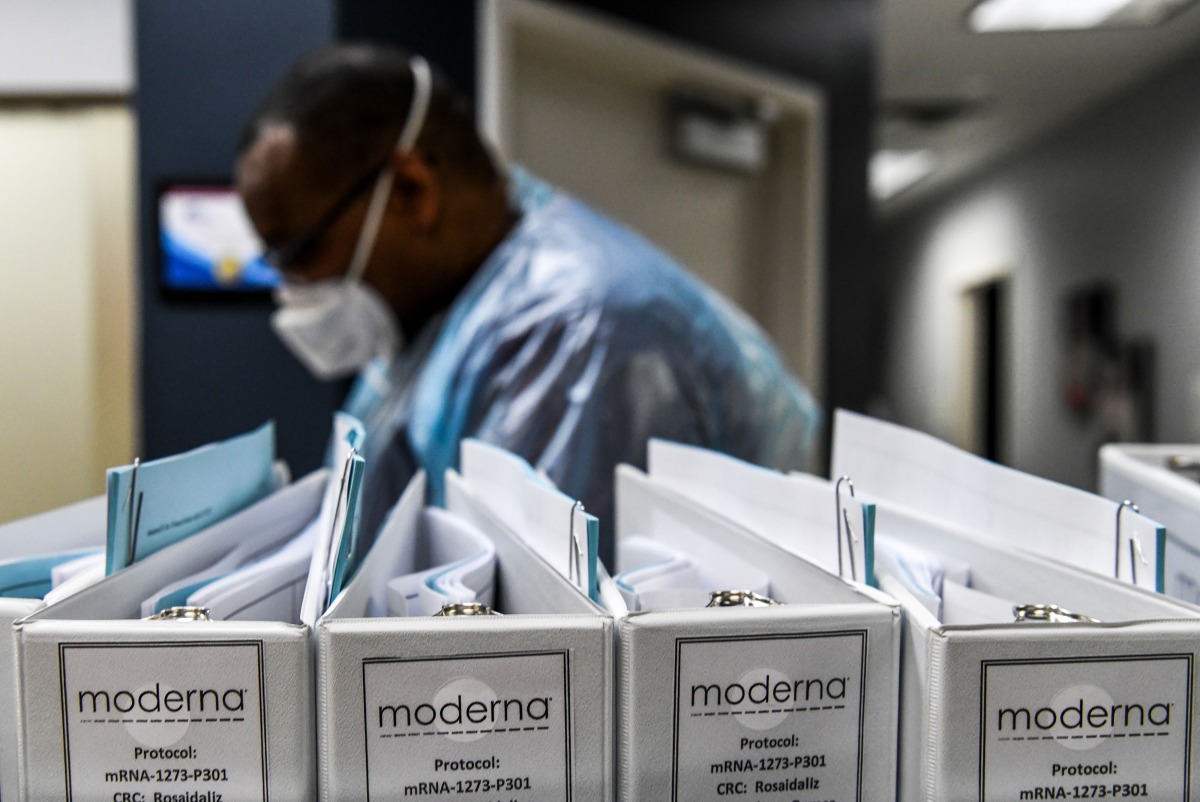 (FILES) In this file photo taken on August 13, 2020, Biotechnology company Moderna protocol files for Covid-19 vaccinations are kept at the Research Centers of America in Hollywood, Florida. / AFP / CHANDAN KHANNA
