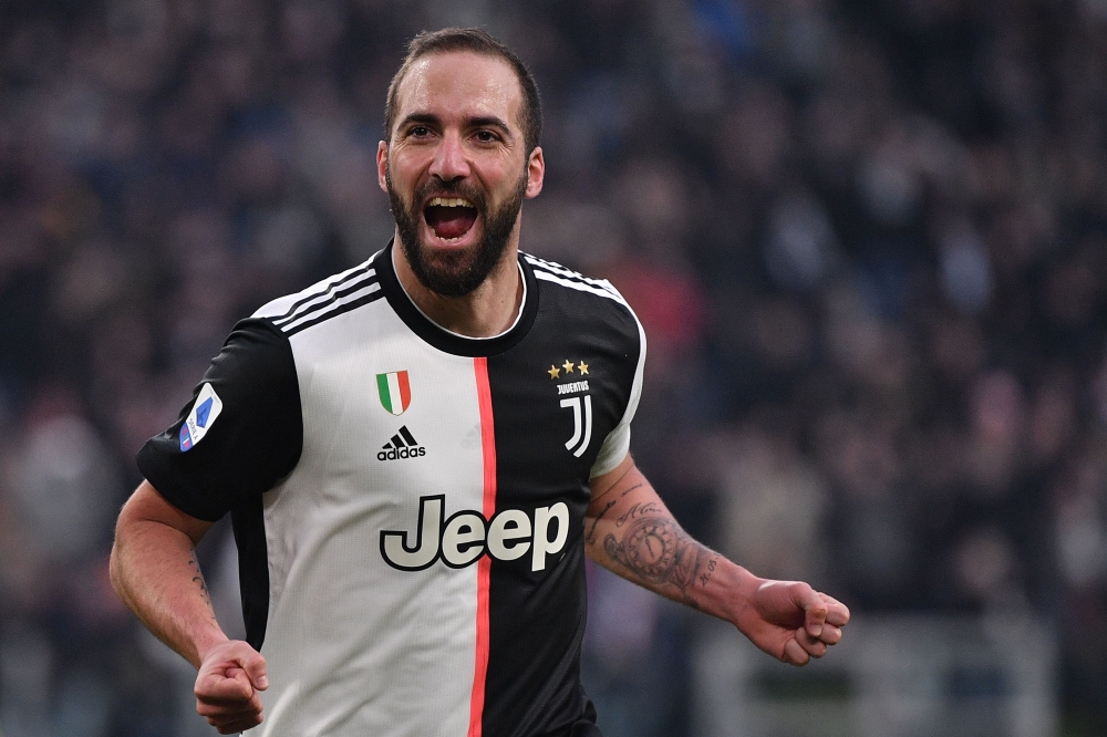In this file photo taken on January 06, 2020 Juventus' Argentinian forward Gonzalo Higuain celebrates after scoring during the Italian Serie A football match Juventus vs Cagliari at the Juventus Allianz stadium in Turin. Argentine striker Gonzalo Higuain 