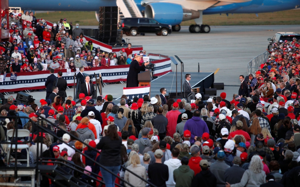 A sign is displayed as US President Donald Trump holds a campaign rally at Bemidji Regional Airport in Bemidji, Minnesota, US, September 18, 2020. Reuters/Tom Brenner