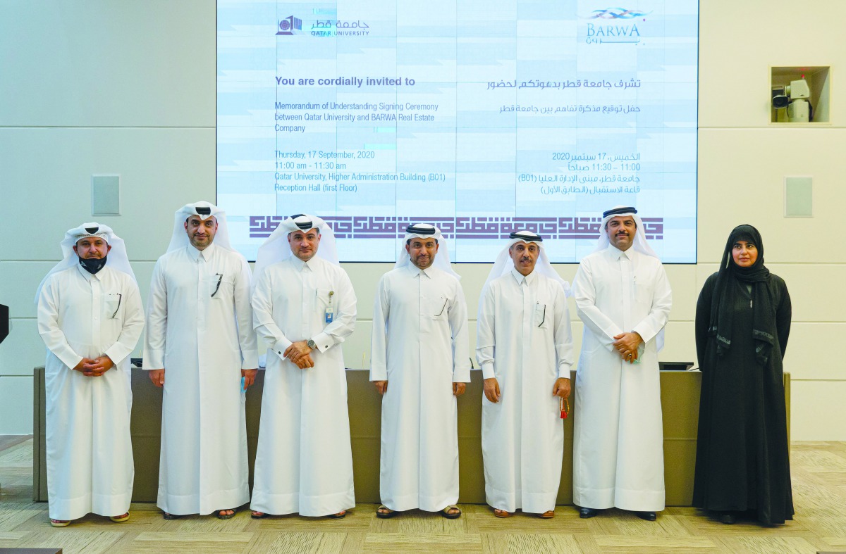 CEO of Barwa Real Estate Group, Abdullah bin Jobara Al Rumaihi, and President of Qatar University, Dr. Hassan bin Rashid Al Derham, with other officials during the signing of the MoU.