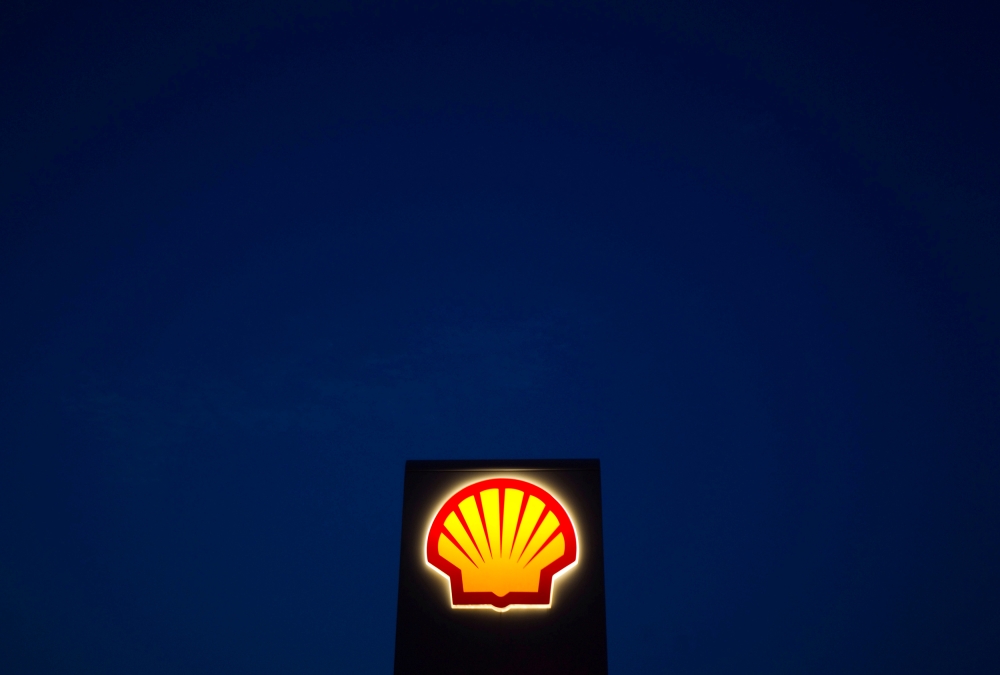 A Shell oil and gas sign is pictured near Nowshera, Pakistan's northwest Khyber-Pakhtunkhwa Province Sept. 8, 2010. REUTERS/Morteza Nikoubazl/File Photo