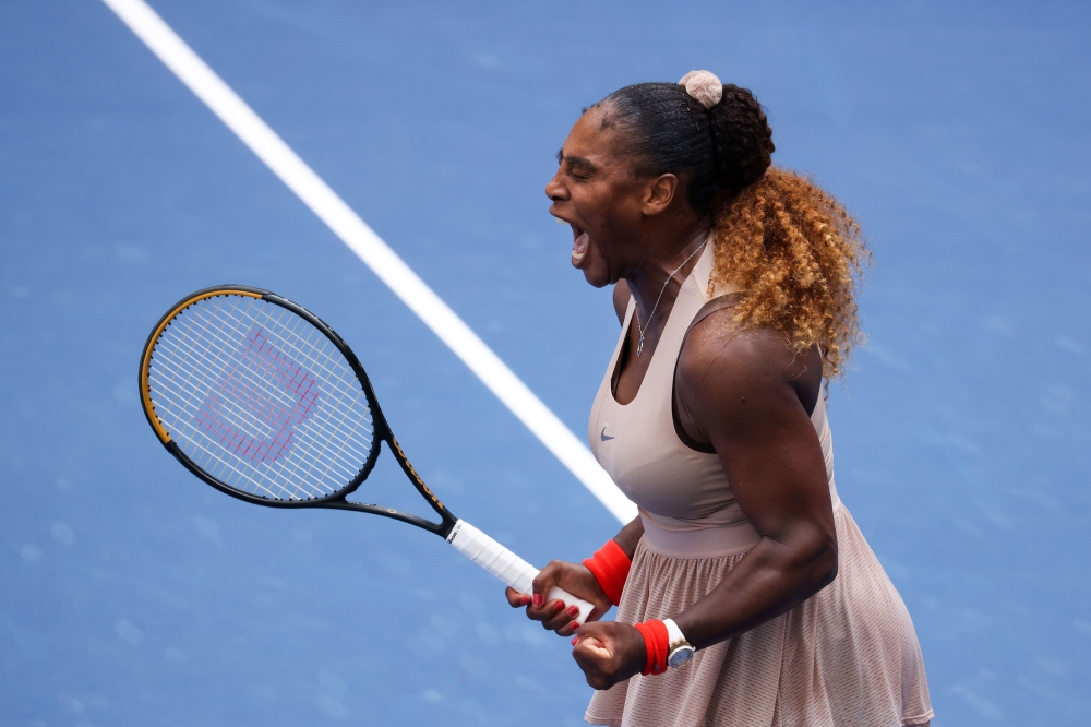 Serena Williams of the United States celebrates winning match point in the third set during her Women's Singles fourth round match against Maria Sakkari of Greece on Day Eight of the 2020 US Open at the USTA Billie Jean King National Tennis Center on Sept