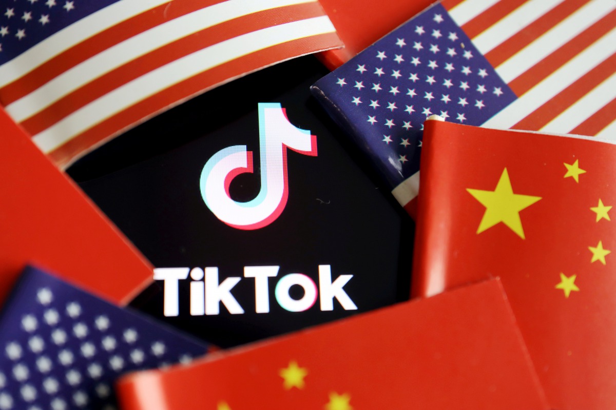 FILE PHOTO: China and U.S. flags are seen near a TikTok logo in this illustration picture taken July 16, 2020. REUTERS/Florence Lo/Illustration/File Photo/File Photo
