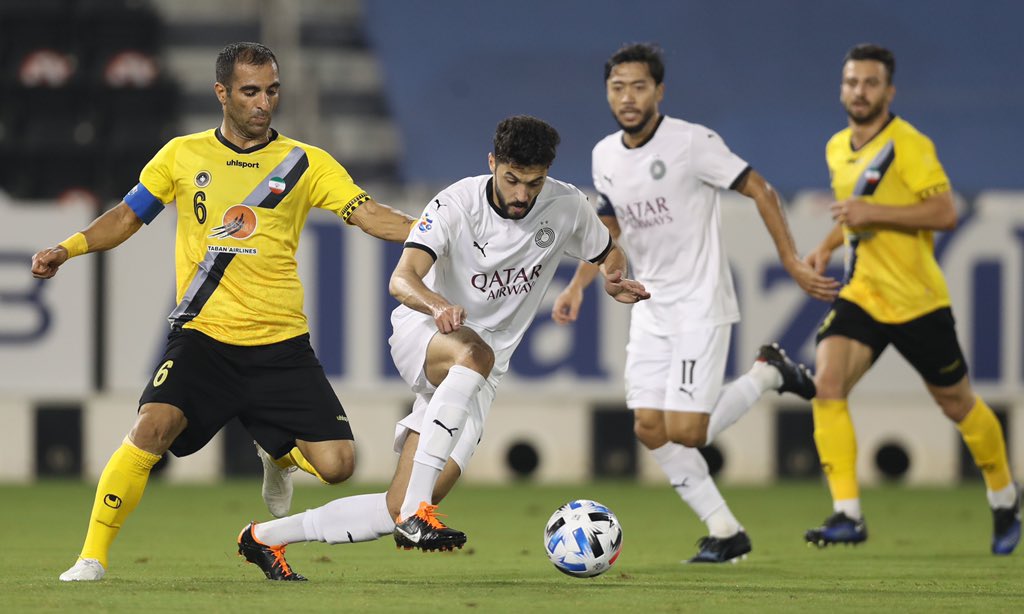 Al Sadd and Sepahan FC players in action during their last Group D match of the AFC Champions League, played at the Jassim Bin Hamad Stadium, yesterday. PIC: TWITTER/ @ALSADDSC