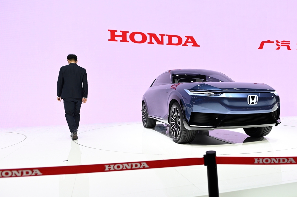 A Honda EV car is displayed at the Beijing Auto Show in Beijing on September 26, 2020. / AFP / WANG Zhao