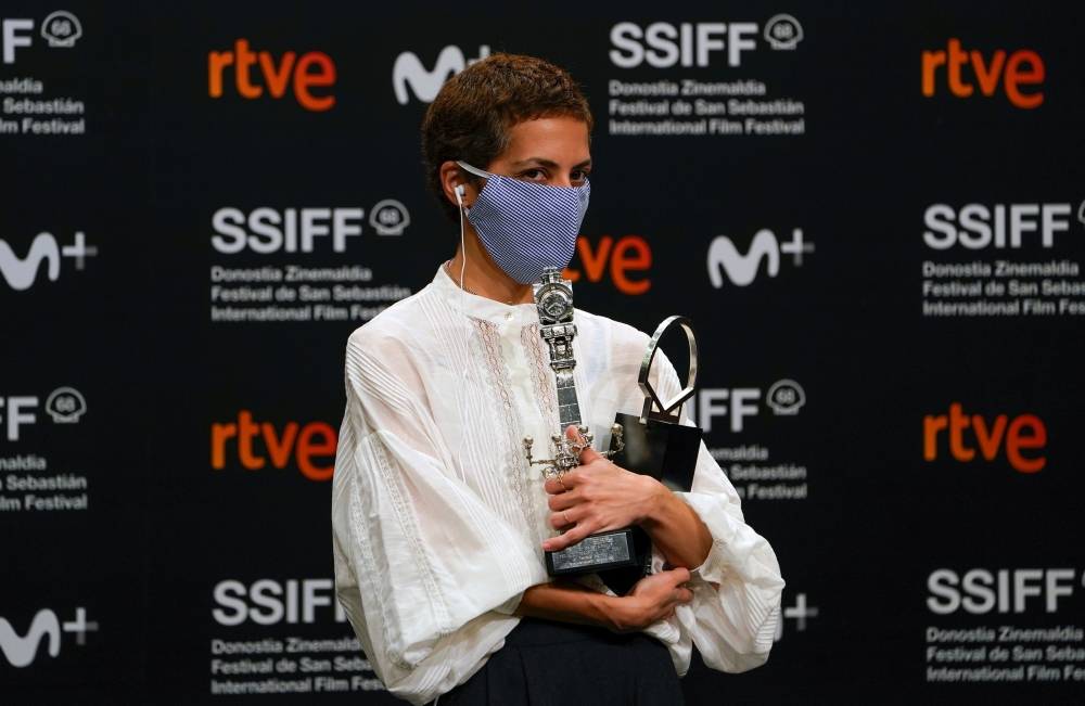 Director Dea Kulumbegashvili, holds the Concha de Plata (Silver Shell) for Best Director and the Jury Award for Best Screenplay for the film 