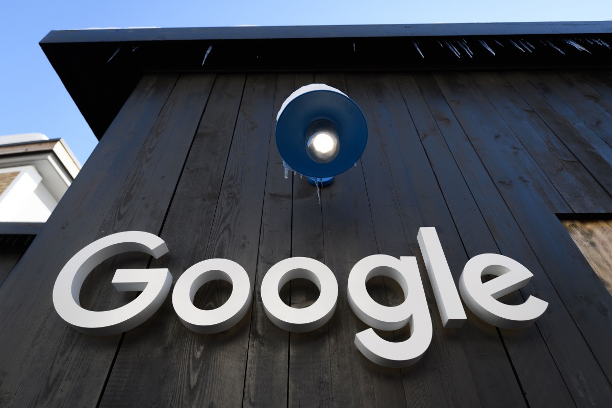 (FILES) In this file photo a Google logo is seen on the brand's stand ahead of the annual meeting of the World Economic Forum (WEF) in Davos, on January 20, 2020. / AFP / Fabrice COFFRINI
