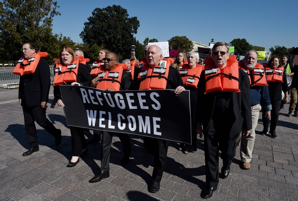 (FILES) In this file photo taken on October 15, 2019 activists hold a civil disobedience protest against 