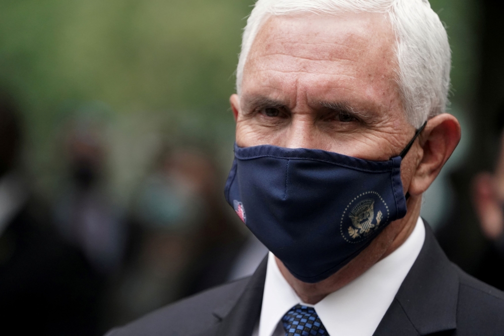 U.S. Vice President Mike Pence wears a protective face mask as he attends ceremonies marking the 19th anniversary of the September 11, 2001 attacks on the World Trade Center at the 911 Memorial & Museum in the Manhattan borough of New York City, New York,