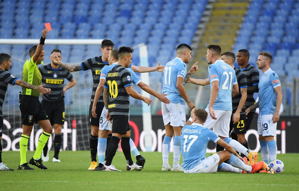 Lazio's Ciro Immobile is sent off by referee Marco Guida REUTERS/Alberto Lingria
