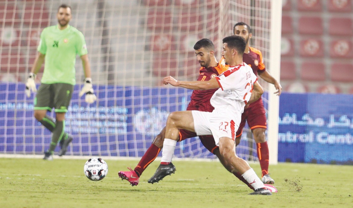 Action during the Ooredoo Cup Group B Round 2 match between Al Arabi and Umm Salal, yesterday.