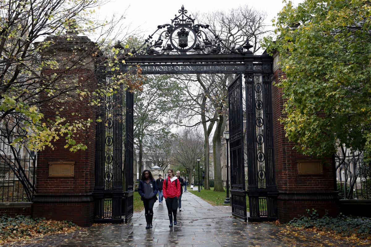 FILE PHOTO: Students walk on the campus of Yale University in New Haven, Connecticut November 12, 2015. REUTERS/Shannon Stapleton/File Photo
