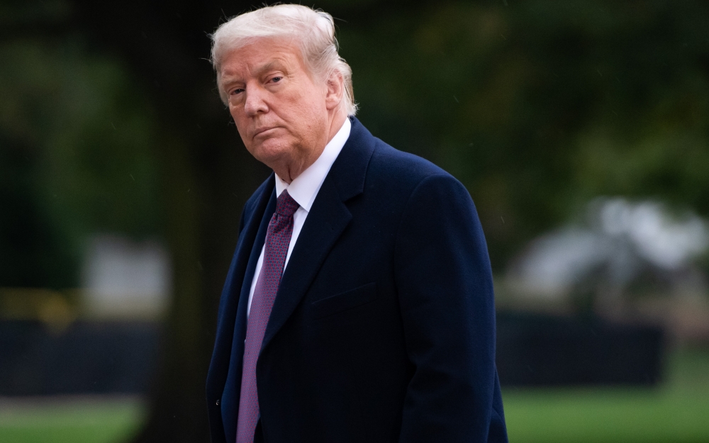  In this file photo taken on October 1, 2020 US President Donald Trump walks from Marine One after arriving on the South Lawn of the White House in Washington, DC, following campaign events in New Jersey. President Donald Trump should be able to resume 