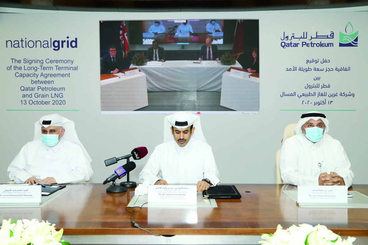 Minister of State for Energy Affairs, President and CEO of Qatar Petroleum, H E Saad Sherida Al Kaabi (centre), during the agreement signing ceremony with UK’s National Grid Grain LNG, held virtually, yesterday. 