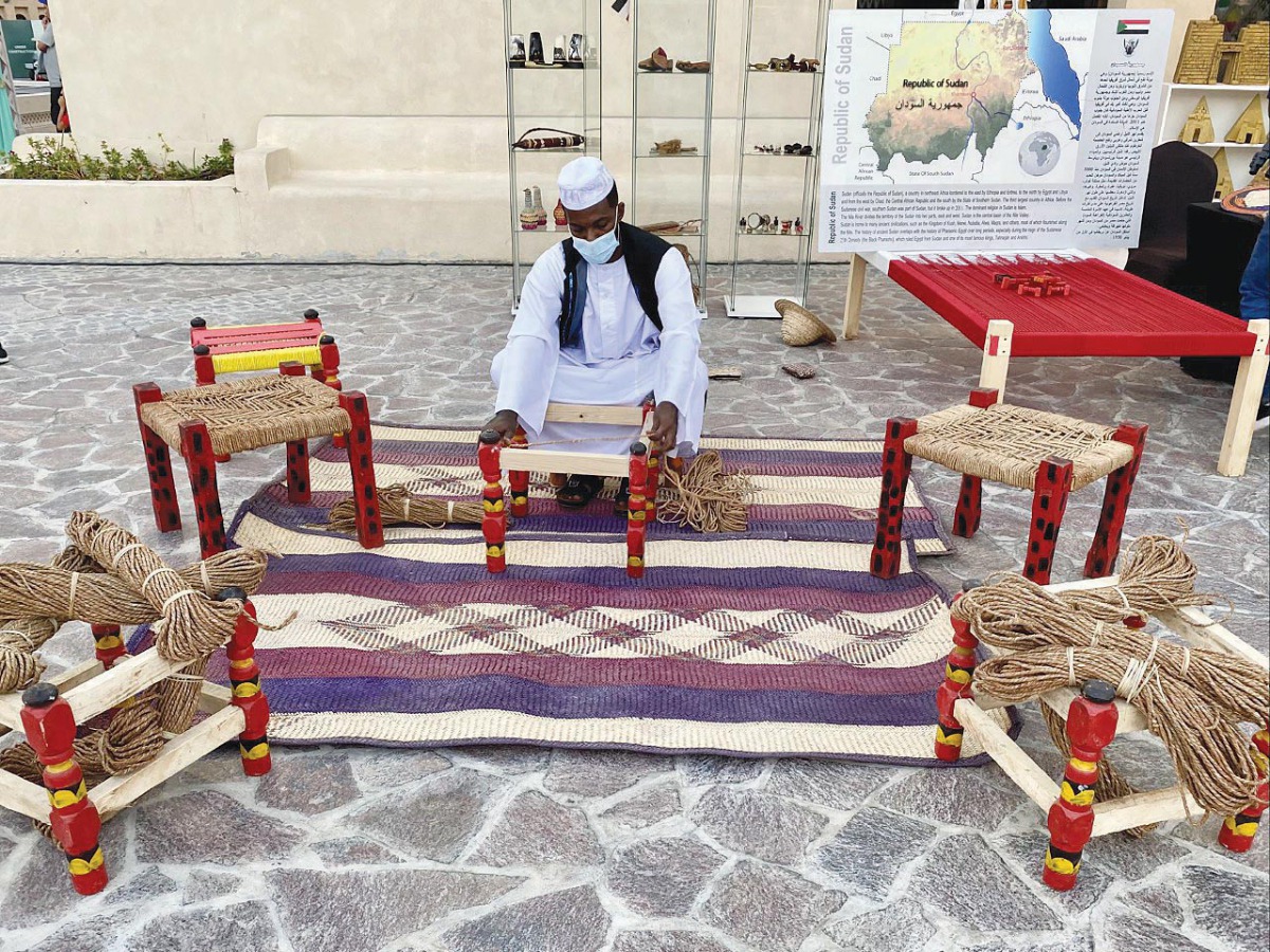A Sudanese craftsman making traditional chairs at the launch of the third Traditional Handicraft Exhibition at Katara, yesterday. Pics: Raynald C Rivera / The Peninsula 