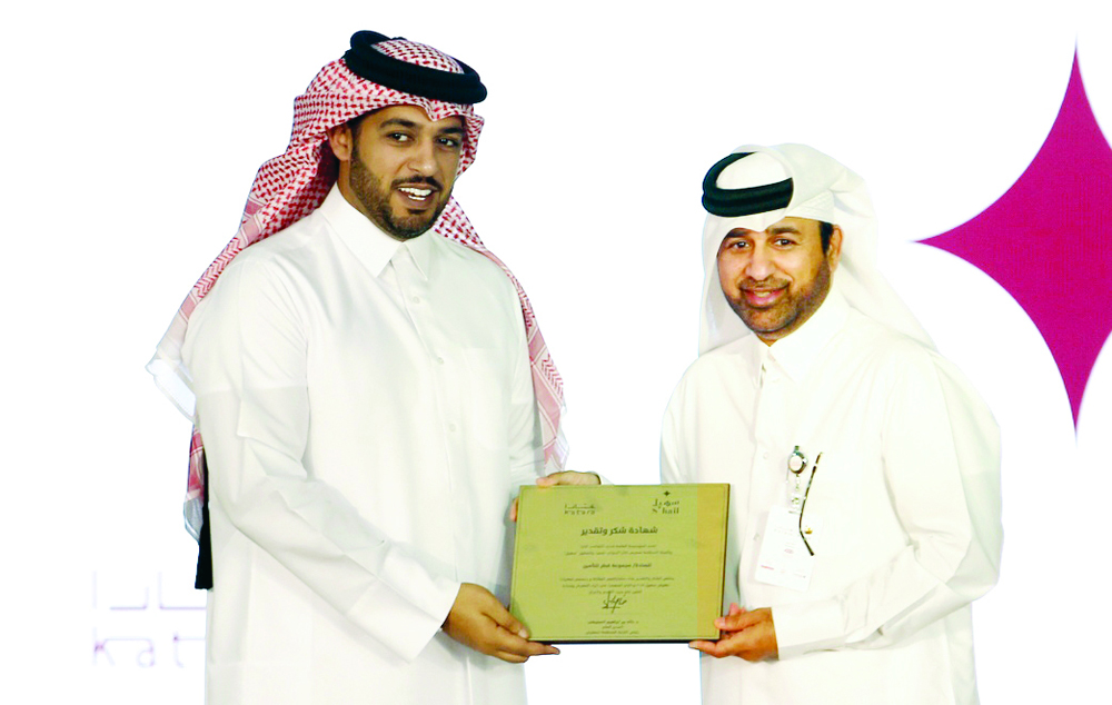 CEO of QIC Group, Salem Al Mannai with Katara General Manager Khalid bin Ibrahim Al Sulaiti