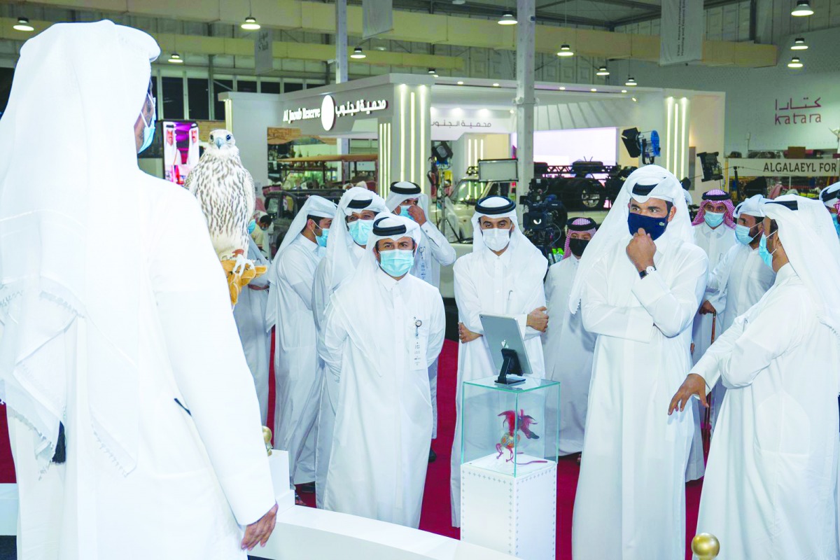 President of Qatar Olympic Committee, H E Sheikh Joaan bin Hamad Al Thani; Katara General Manager Khalid bin Ibrahim Al Sulaiti; and other officials at the Katara International Hunting and Falcons Exhibition (S’hail 2020), yesterday.  