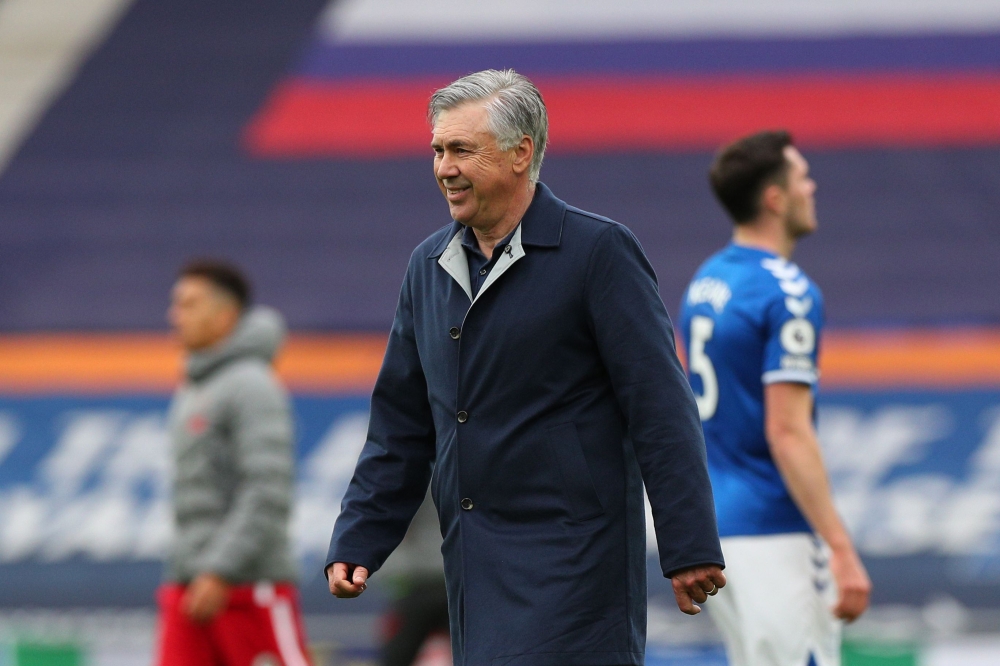 Everton's Italian head coach Carlo Ancelotti reacts at the final whistle during the English Premier League football match between Everton and Liverpool at Goodison Park in Liverpool, north west England on October 17, 2020.  / AFP / POOL / Peter Byrne /