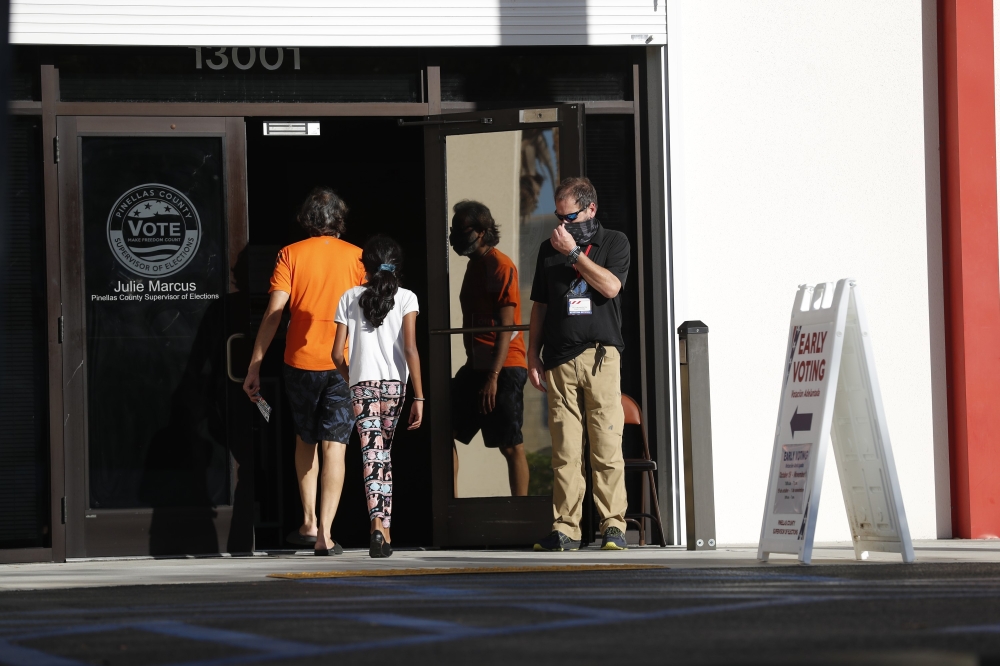 Early voters cast their ballots at the Pinellas County Supervisor of Elections office polling station on October 25, 2020 in Largo, Florida. Octavio Jones/Getty Images/AFP
