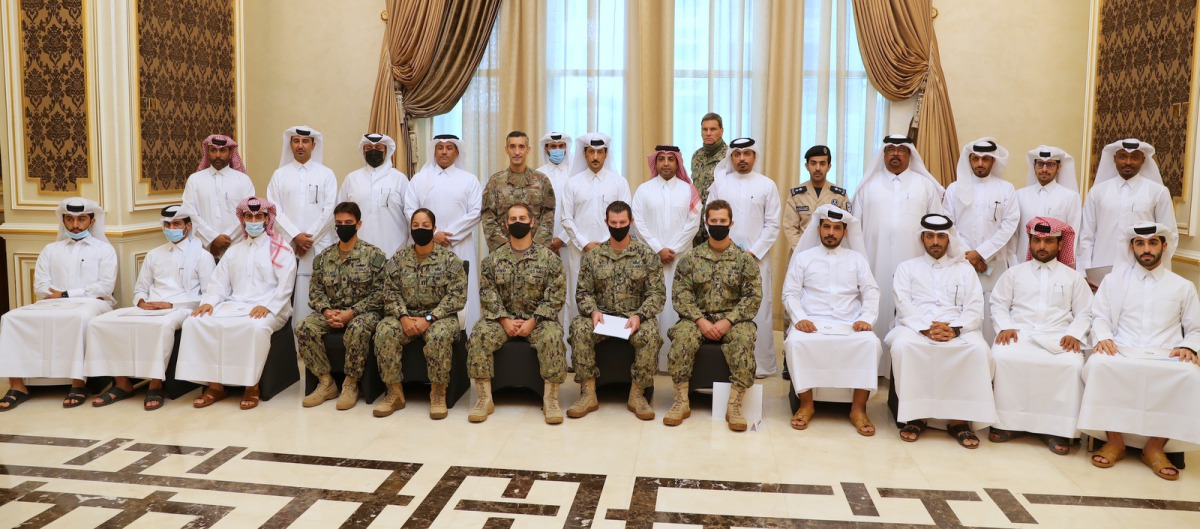 Participants at the workshop with officials.