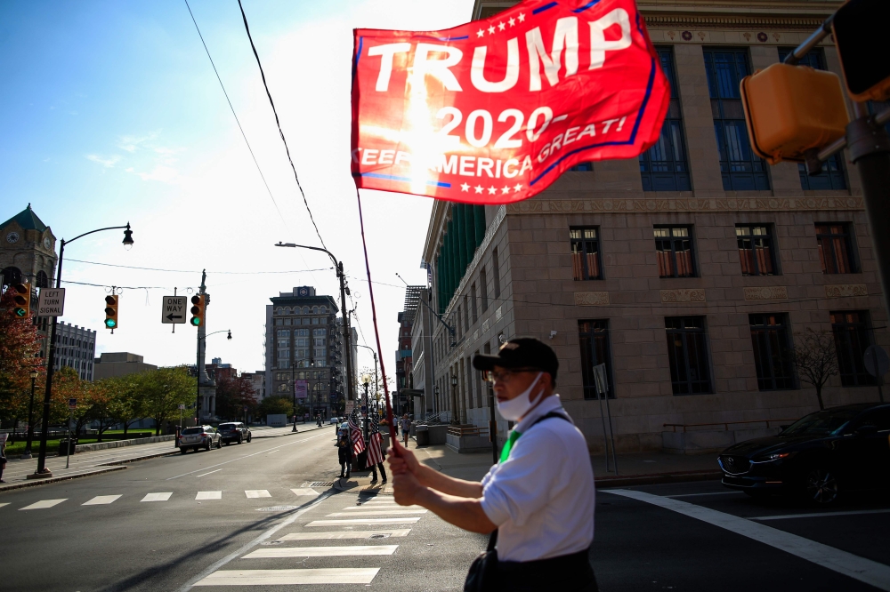 Trump supporters from Japan gather to show support for the President on October 23, 2020 in Scranton, Pennsylvania.  AFP / Kena Betancur