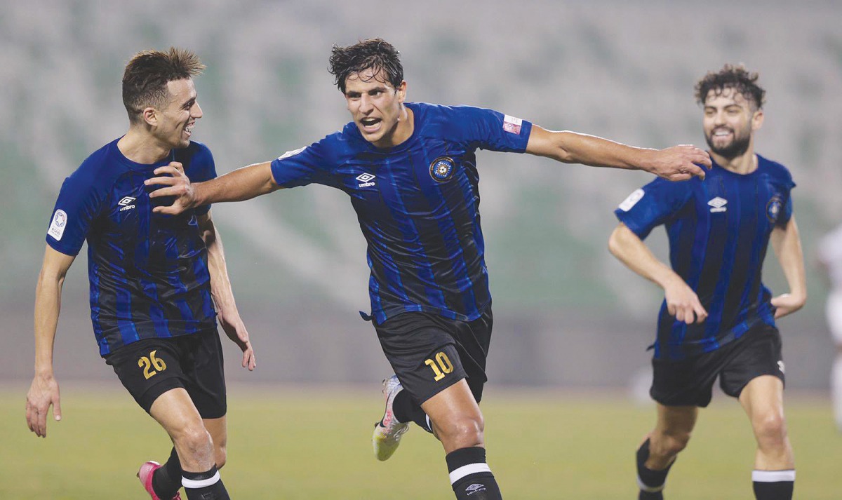 Al Sailiya's Mohanad Ali (centre) celebrates after scoring his second goal yesterday.