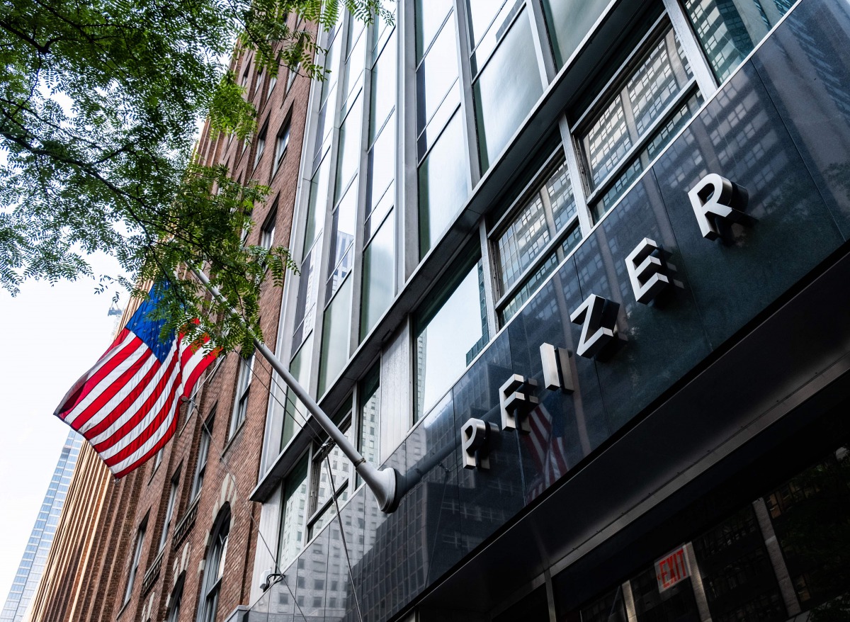 (FILES) In this file photo taken on July 22, 2020, pfizer Inc. headquarters is seen in New York City. pfizer reported lower third-quarter profits on October 27, 2020 as Covid-19 dented demand for some medicines from patients whose regular health care patt