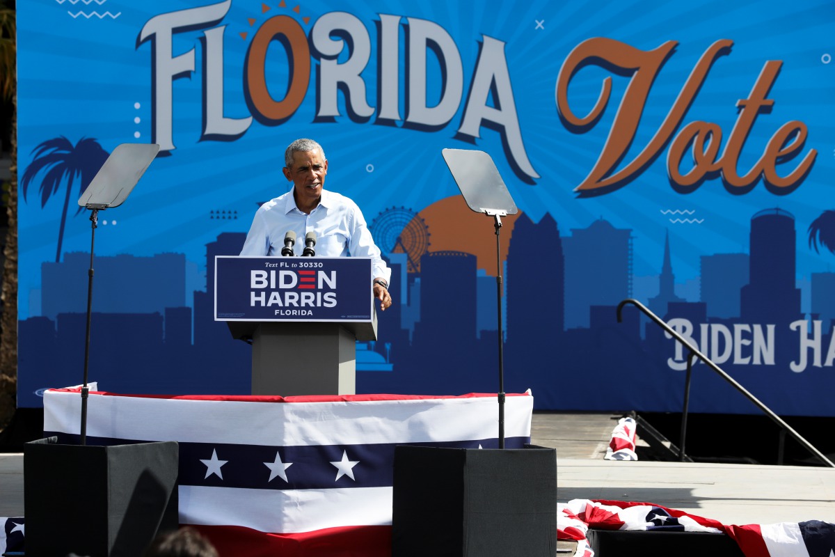 Former U.S. President Barack Obama hosts a pre-election drive-in rally to campaign on behalf of Democratic presidential nominee and his former Vice President Joe Biden in Orlando, Florida, U.S. October 27, 2020. REUTERS/Eve Edelheit
