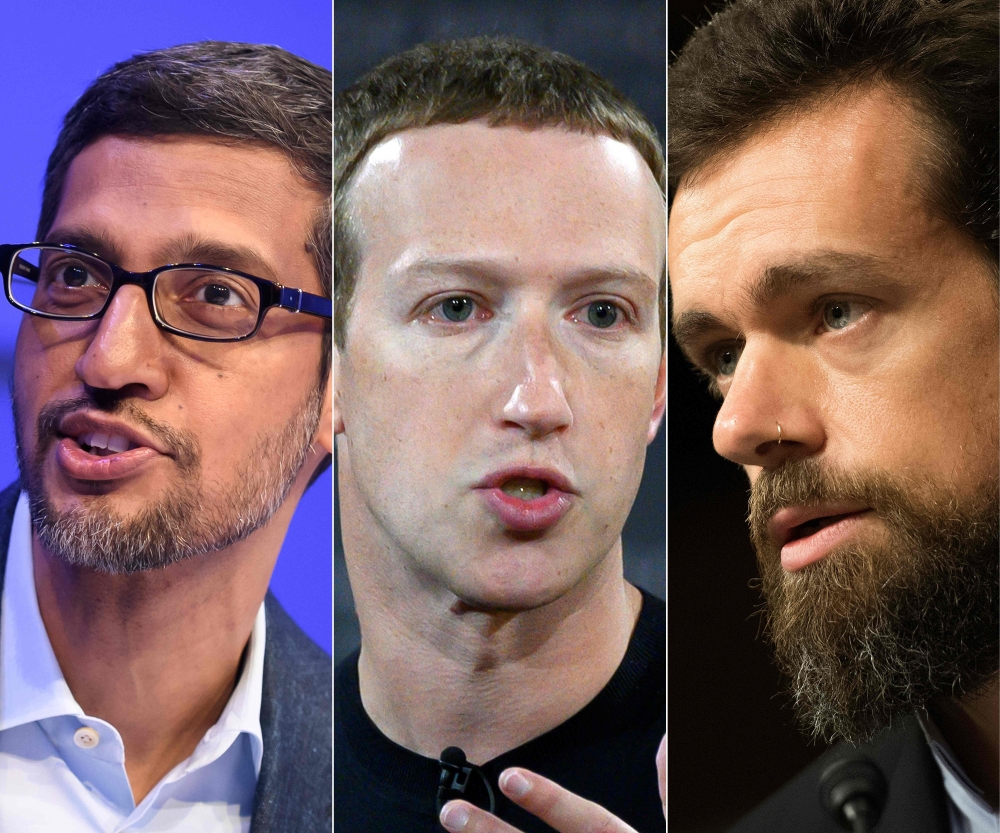 (COMBO)(L-R) This combination of file photos created on October 1, 2020 shows Alphabet CEO Sundar Pichai during a session at the World Economic Forum (WEF) annual meeting in Davos, on January 22, 2020, Facebook founder Mark Zuckerberg at Georgetown Univer
