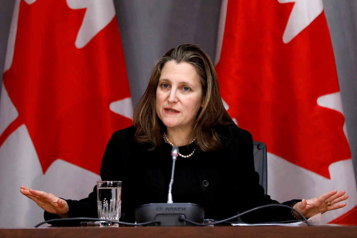 FILE PHOTO: Canada's Deputy Prime Minister Chrystia Freeland attends a news conference on the coronavirus disease (COVID-19) outbreak on Parliament Hill in Ottawa, Ontario, Canada March 19, 2020. REUTERS/Blair Gable/File Photo
