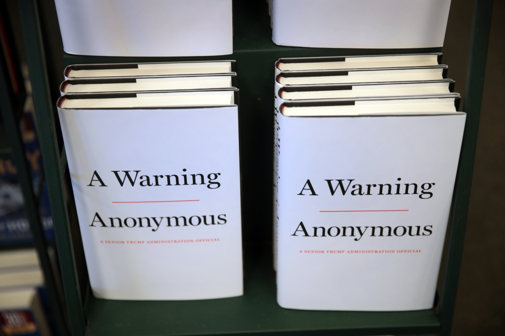 (FILES) In this file photo taken on November 18, 2019 copies of 