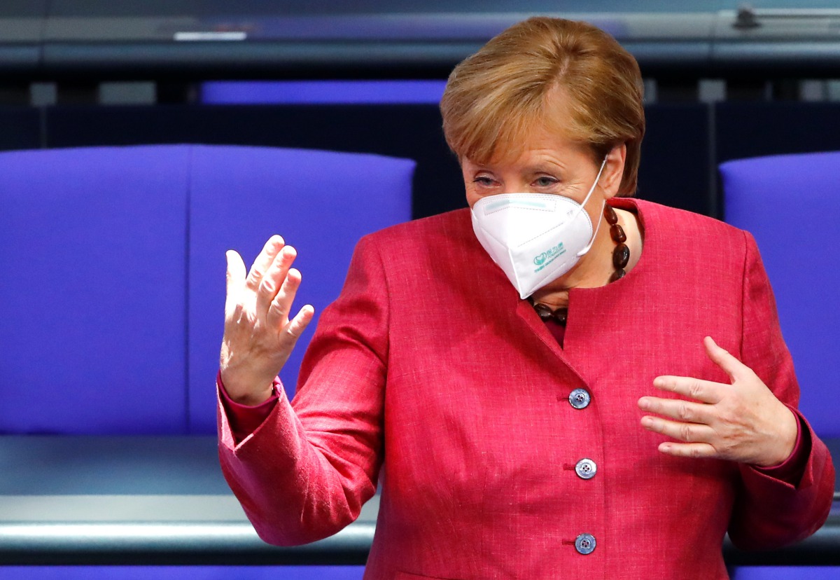 German Chancellor Angela Merkel wears a face mask as she attends a session of the German lower house of parliament Bundestag, as the spread of the coronavirus disease (COVID-19) continues in Berlin, Germany, October 29, 2020. REUTERS/Fabrizio Bensch
