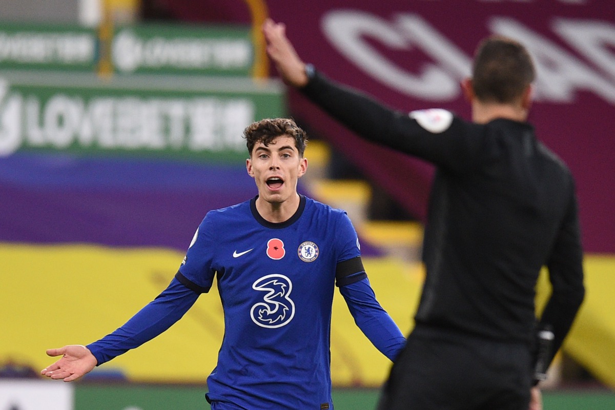 Chelsea's German midfielder Kai Havertz (L) reacts after a decision from Referee David Coote during the English Premier League football match between Burnley and Chelsea at Turf Moor in Burnley, north west England on October 31, 2020. / AFP / POOL / Oli S