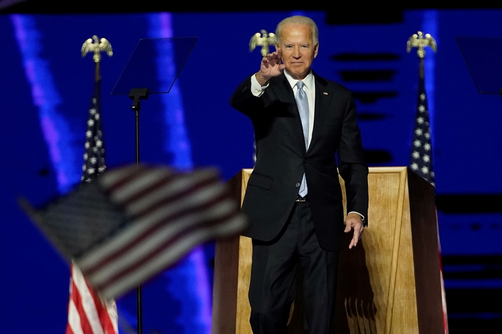 US President-elect Joe Biden delivers remarks in Wilmington, Delaware, on November 7, 2020, after being declared the winner of the US presidential election. / AFP / POOL / Andrew Harnik