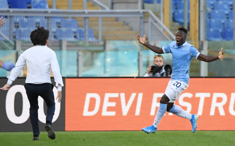 Lazio’s Felipe Caicedo celebrates scoring their first goal with coach Simone Inzaghi REUTERS/Alberto Lingria