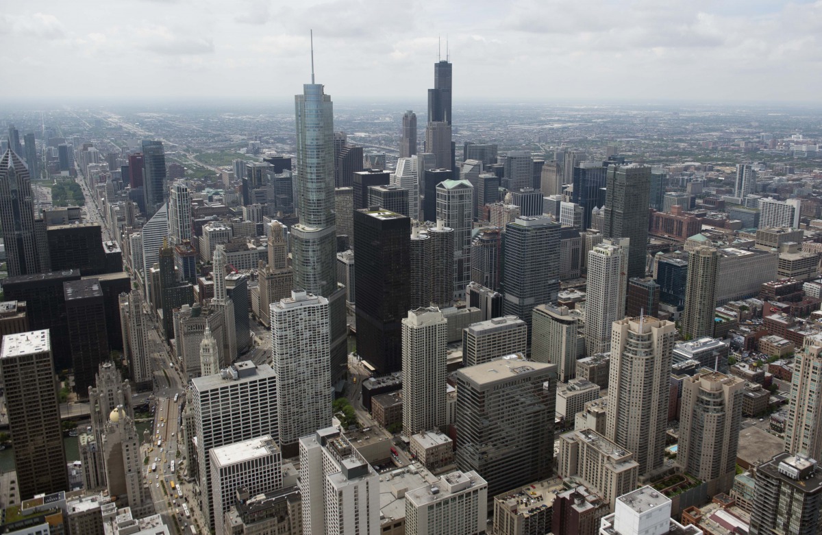 (FILES) In this file photo the downtown Chicago skyline, including the Willis Tower, formerly known as the Sears Tower, are seen in this aerial photograph over Chicago, Illinois, May 30, 2013. The mayor of Chicago, the United States' third biggest city, o