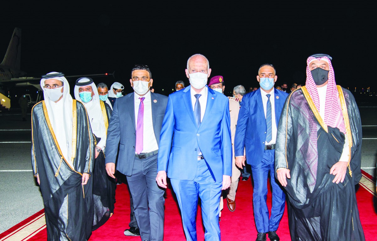 Tunisian President, H E Kais Saied, being received by Deputy Prime Minister and Minister of State for Defence Affairs, H E Dr. Khalid bin Mohammed Al Attiyah; Minister of Culture and Sports, H E Salah bin Ghanem Al Ali; and other officials upon his arriva