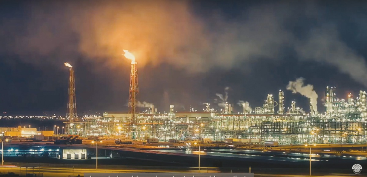 A panoramic view of Mesaieed Industrial Area at night.