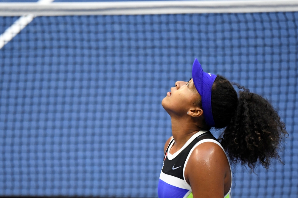 Naomi Osaka of Japan celebrates after her match against Victoria Azarenka of Belarus (not pictured) in the women's singles final on day thirteen of the 2020 U.S. Open tennis tournament at USTA Billie Jean King National Tennis Center. Mandatory Credit: Dan