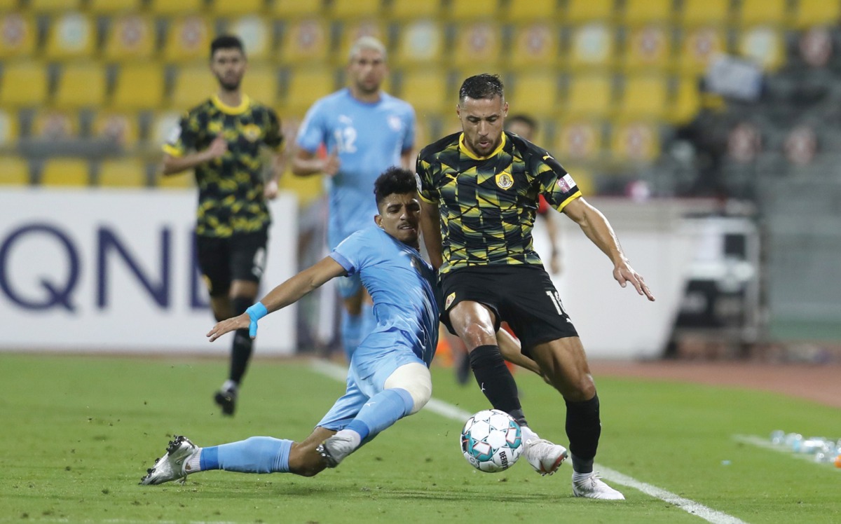 A player of Al Wakrah (in blue) chases a Qatar SC player during their QNB Stars League Round 6 clash at Suheim Bin Hamad Stadium yesterday. Qatar SC won 1-0. 