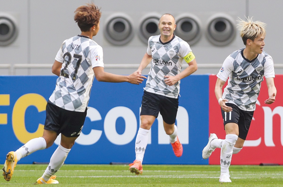 Kobe’s forward Kyogo Furuhashi (right) celebrates his goal during the AFC Champions League group G match against China’s Guangzhou Evergrande at the Khalifa International Stadium, yesterday.