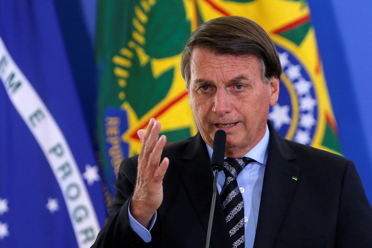 Brazil's President Jair Bolsonaro speaks during a ceremony at the Planalto Palace in Brasilia, Brazil November 26, 2020. REUTERS/Adriano Machado
