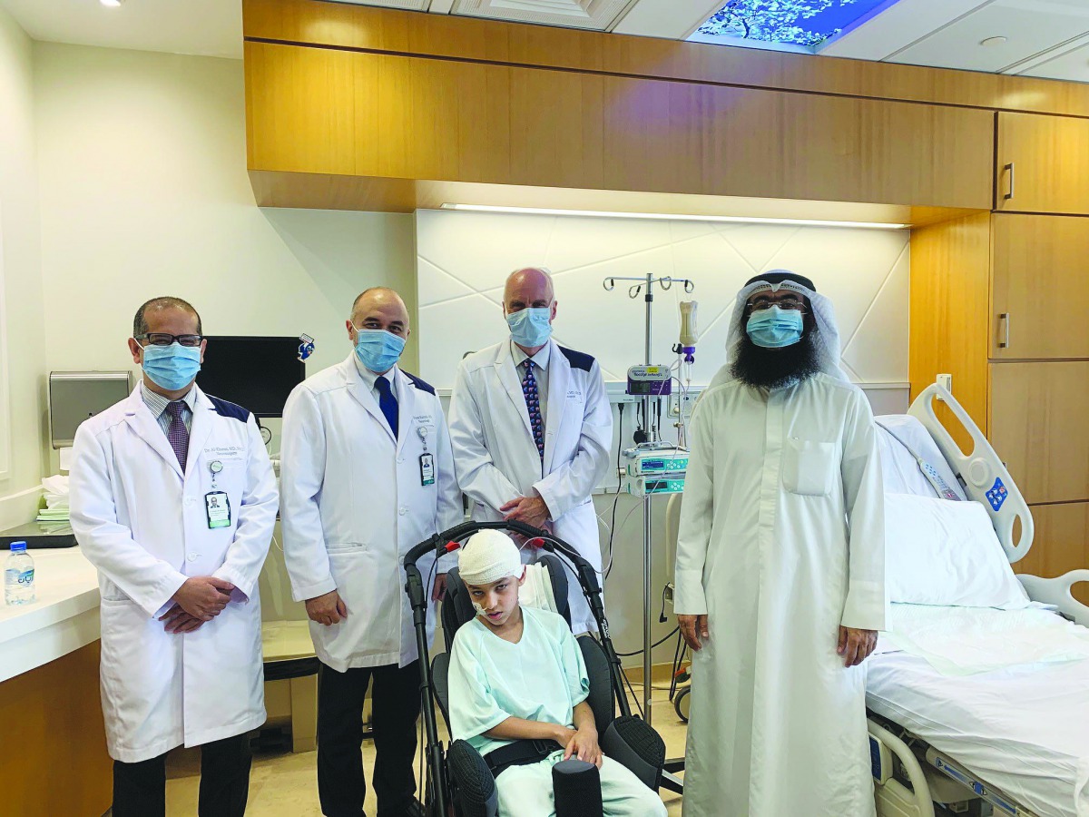 Salem and his father with Dr. Kayyali, Dr. Ian Pople and Dr. Khalid Al Kharazi.