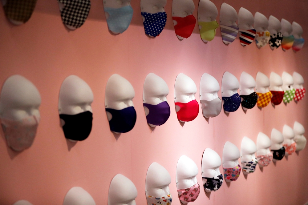 Face masks are displayed at Tokyo Mask Land, a face-mask theme exhibition and its speciality shop, amid the coronavirus disease (COVID-19) outbreak, in Yokohama, Japan December 1, 2020. REUTERS/Issei Kato