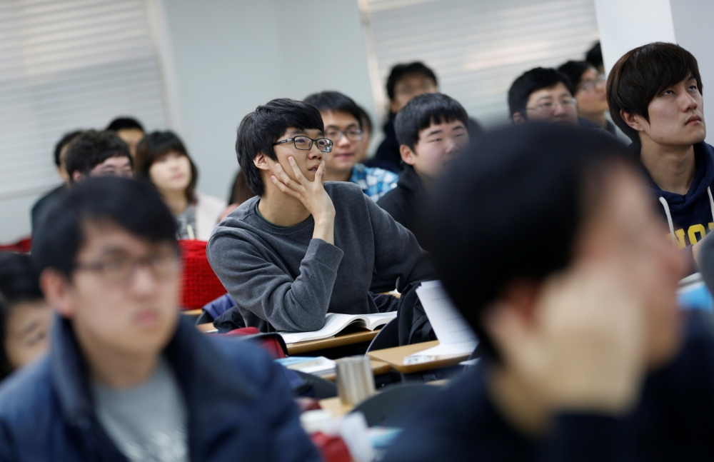 Young South Korean's attend a class at a cram school in a Goshichon, which means 
